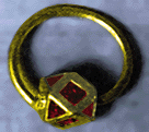 Gold earring in the shape of a cuboctahedron