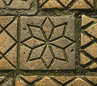 Decoratice tile with eight-fold symmetry